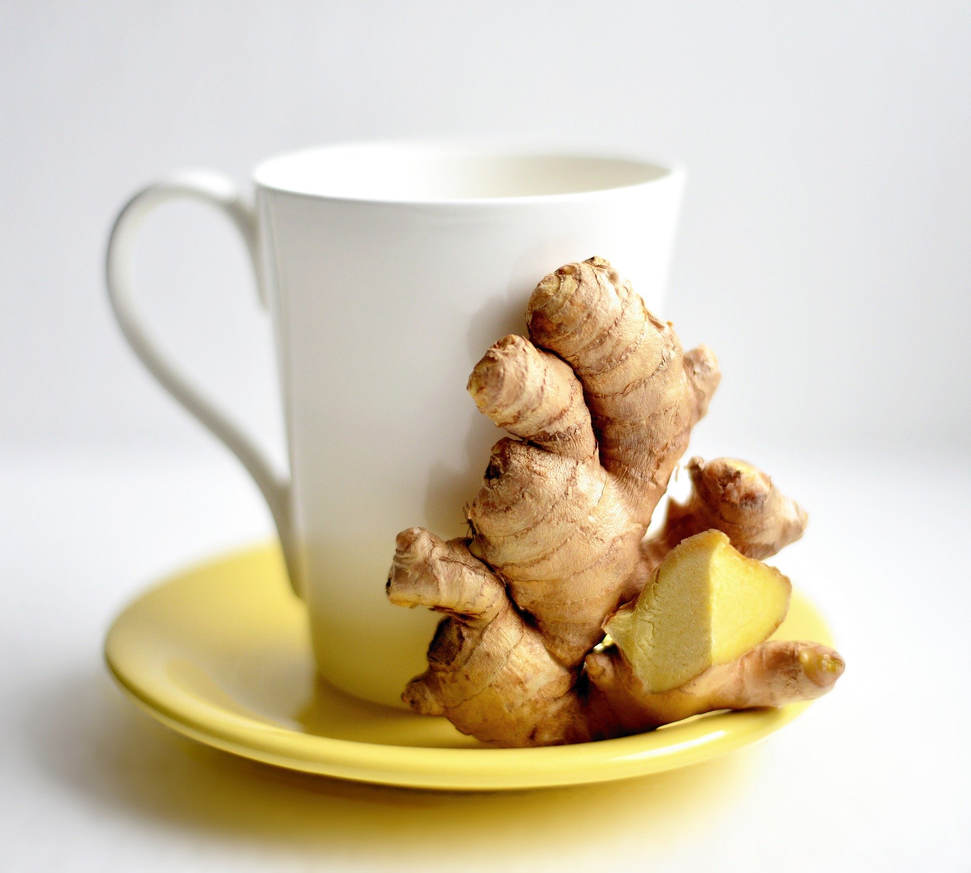 Benefits of Ginger. cup. ginger tea. ginger. cup and plate.